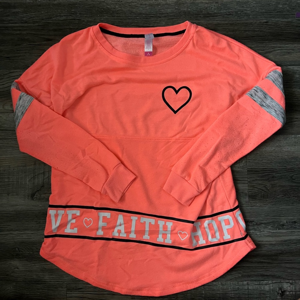 Peach colored long sleeve t-shirt